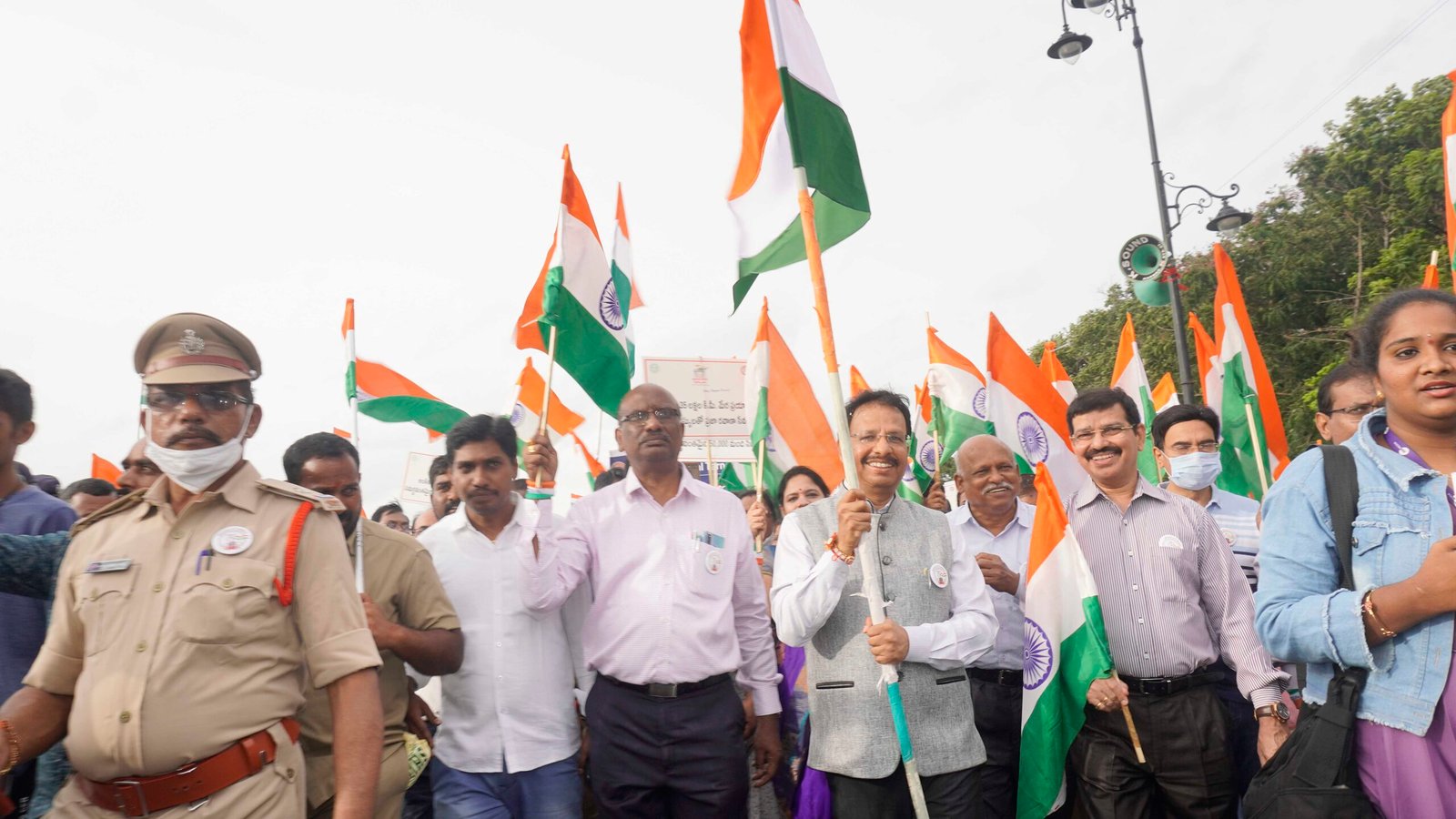 VC Sajjanar, CMD of TSRTC seen marching holding a national flag in his hand along with 1500 RTC staff-7