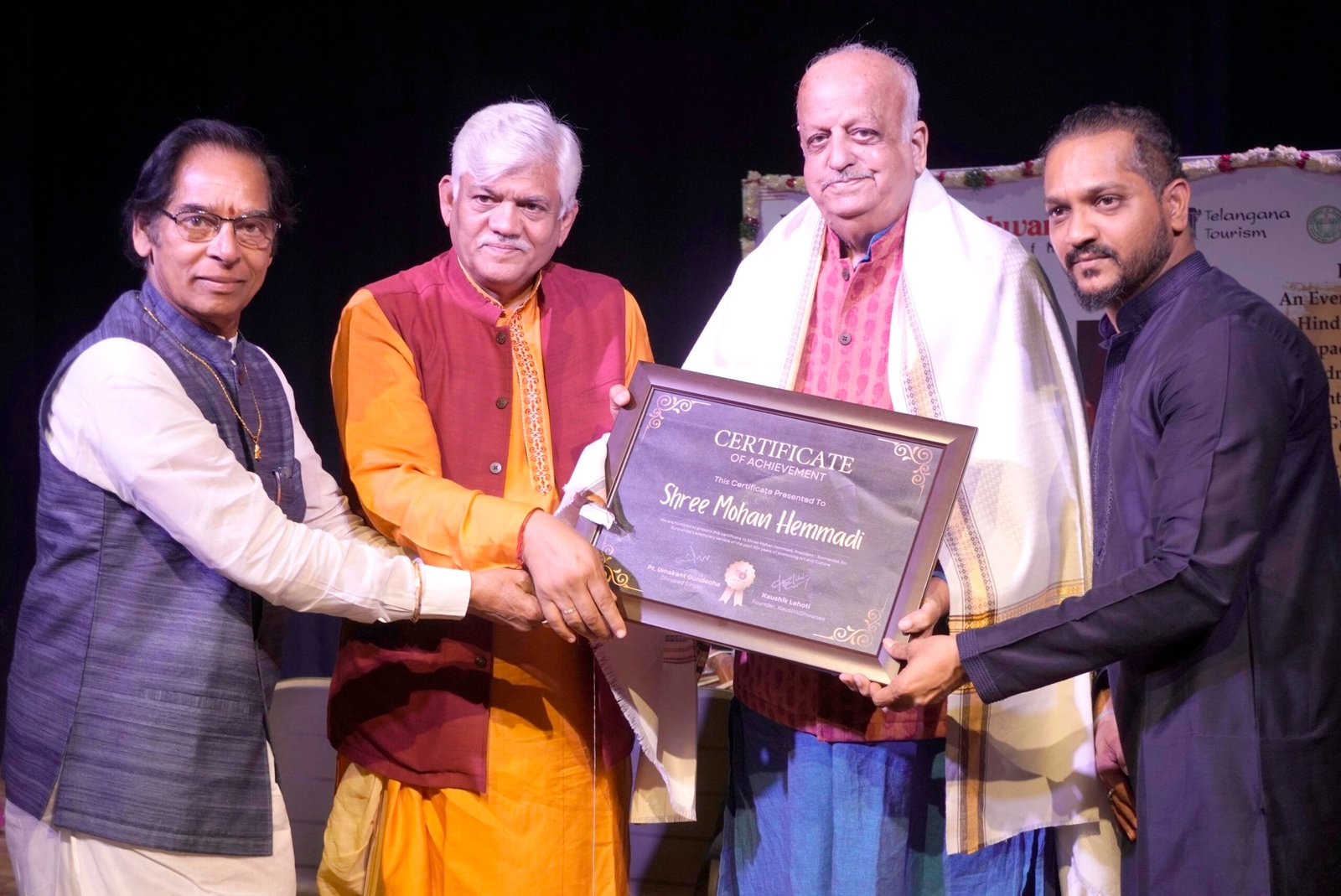 Mohan Hemmadi seen honoured by Umakanth Gundecha on the 2day Music Festival