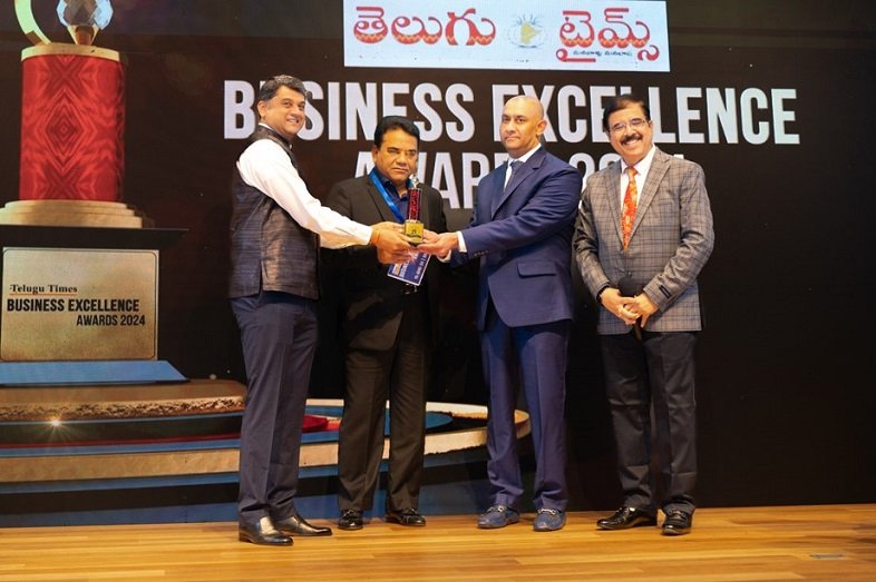 Srikanth Gaddam CEO _ERPA Inc seen receiving Telugu Times Business Excellence Award in IT Category